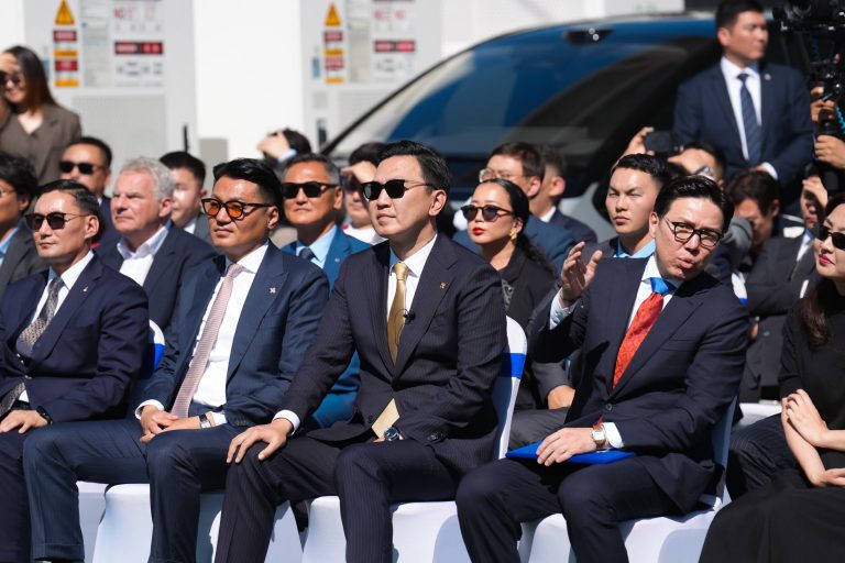 Guests seated at the NEXUS EV Station opening ceremony