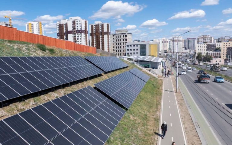 Solar panels on the embankment beside the NEXUS EV Station