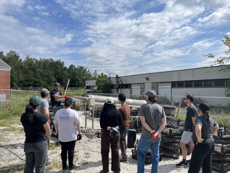 Volunteers gathered for a briefing at the Billion Oyster Project shell site